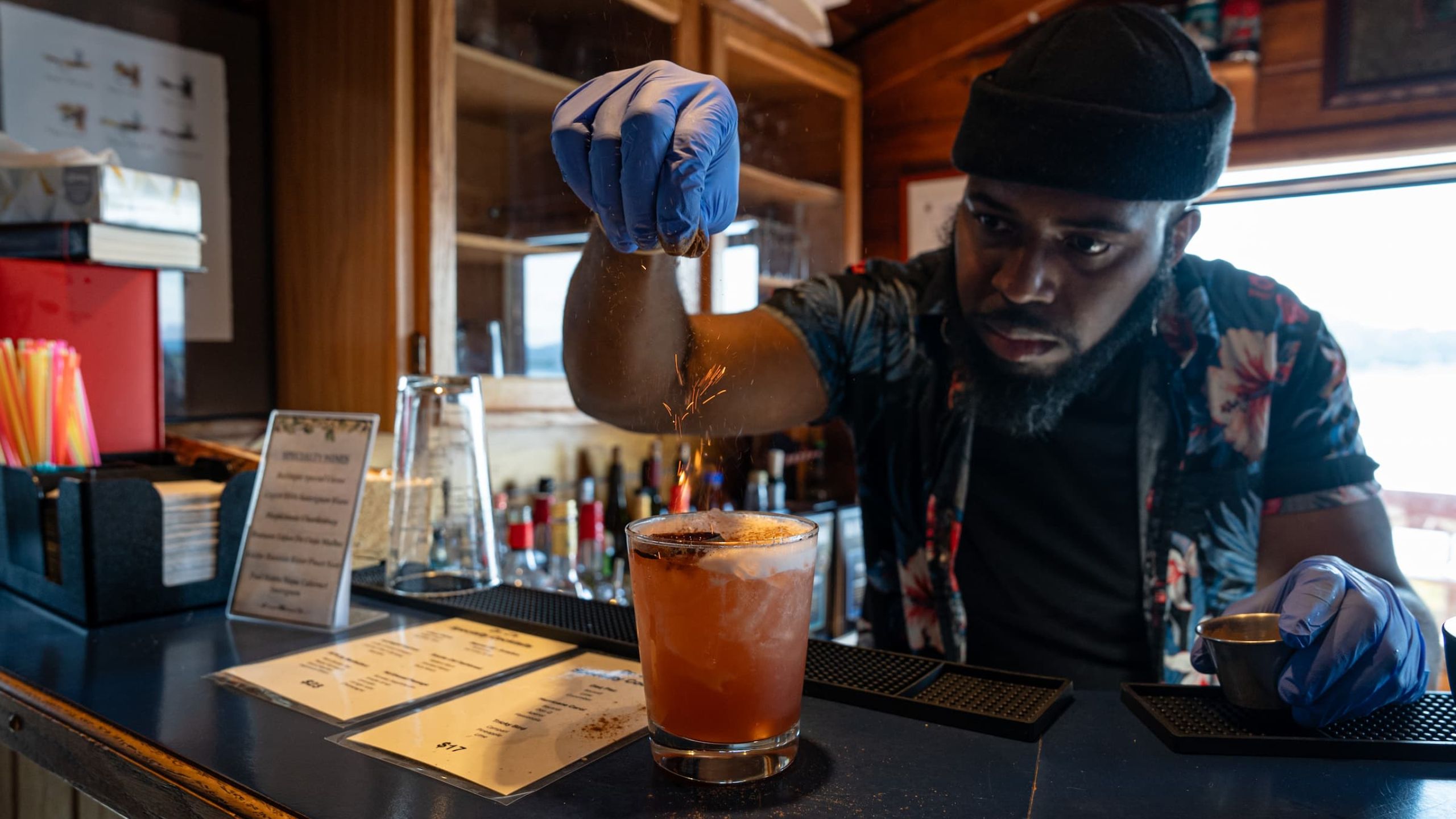 Tikchik Narrows Bartender Mixing Drinks  