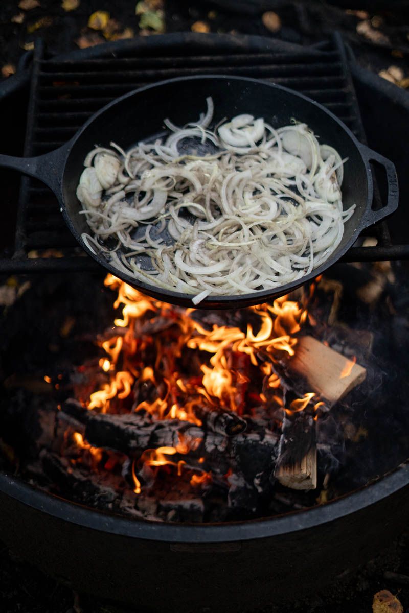 Cooking side dish on an open fire 